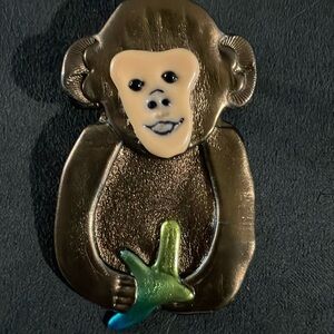 Vintage artisan clay monkey brooch